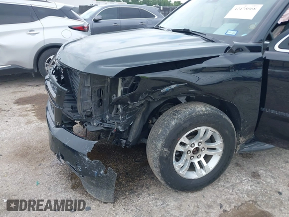 2020 Chevrolet Suburban LT with VIN 1GNSKHKC9LR103062, listed as a IAAI auction lot 42478008 with 229,786 mi miles and . Bid and sale history available at DreamBid. Image 6.