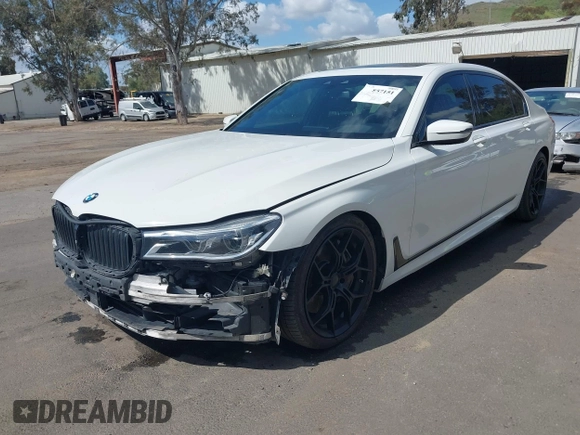 2017 BMW 7 Series 750i with VIN WBA7F0C32HGM22273, listed as a IAAI auction lot 41857151 with 90,518 mi miles and . Bid and sale history available at carsss.com. Image 2.