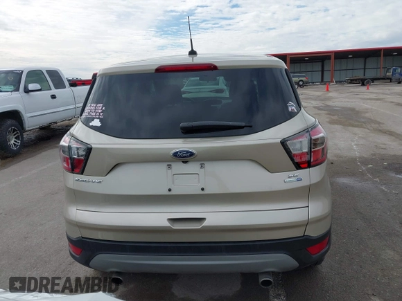 2017 Ford Escape SE with VIN 1FMCU9GD1HUB28732, listed as a IAAI auction lot 41546177 with 126,698 mi miles and . Bid and sale history available at DreamBid. Image 16.