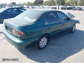 2000 Honda Civic VP with VIN 2HGEJ6610YH573172, listed as a IAAI auction lot 40748705 with 221,801 mi miles. Bid and sale history available at carsss.com. Image 4.