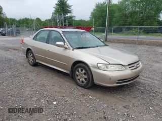 2002 Honda Accord EX z VIN 1HGCG56632A133738, wystawiony jako IAAI lot #42104355 z przebiegiem 236 202 mil mil oraz . Historia ofert i sprzedaży dostępna na DreamBid. Obrazek 1.