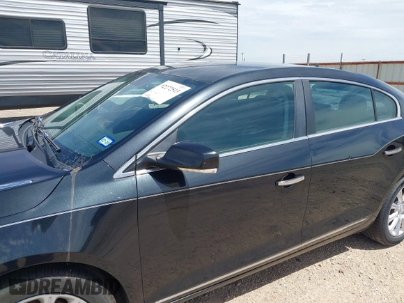 2013 Buick LaCrosse Premium 1 z VIN 1G4GF5E34DF264852, wystawiony jako IAAI lot #42272513 z przebiegiem 125 382 mil mil oraz . Historia ofert i sprzedaży dostępna na DreamBid. Obrazek 6.