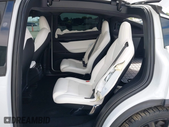 2021 Tesla Model X Long Range Plus with VIN 5YJXCBE23MF321243, listed as a IAAI auction lot 42100580 with 59,878 mi miles and . Bid and sale history available at carsss.com. Image 8.