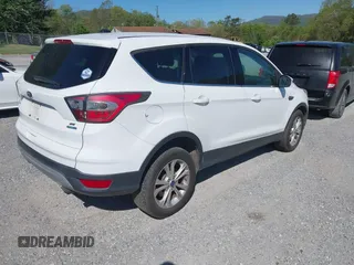 2017 Ford Escape SE with VIN 1FMCU9GD3HUA40233, listed as a IAAI auction lot 42126271 with 284,937 mi miles. Bid and sale history available at carsss.com. Image 4.