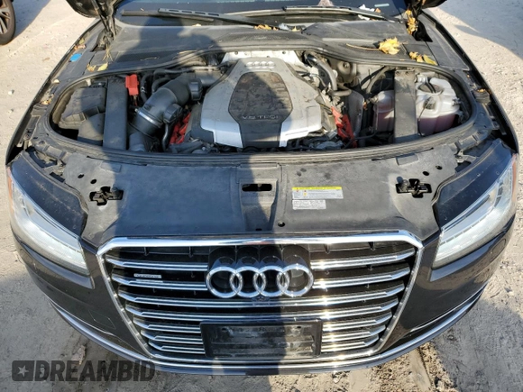 2015 Audi A8 z VIN WAUJGAFD7FN032176, wystawiony jako Copart lot #76943904 z przebiegiem 126 423 mil mil oraz Czysty tytuł • Clean title. Historia ofert i sprzedaży dostępna na DreamBid. Obrazek 11.