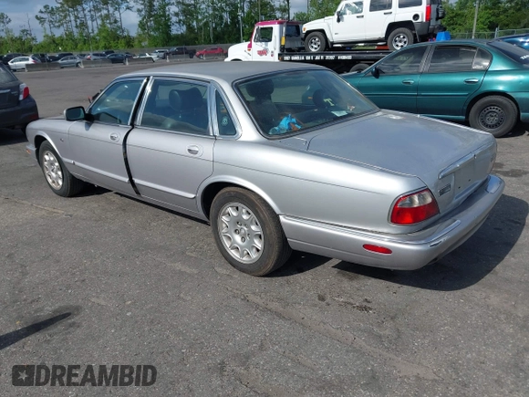 2000 Jaguar XJ with VIN SAJDA14C4YLF13470, listed as a IAAI auction lot 42136313 with 237,063 mi miles and . Bid and sale history available at DreamBid. Image 3.