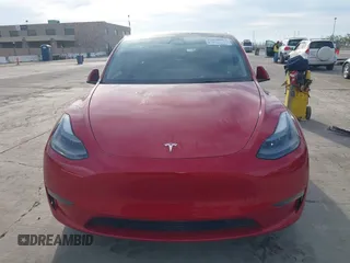 2023 Tesla Model Y Long Range with VIN 7SAYGAEE7PF713761, listed as a IAAI auction lot 41638067 with 46,089 mi miles and . Bid and sale history available at DreamBid. Image 12.