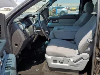2012 Ford F-150 XL with VIN 1FTFW1EF2CFC06627, listed as a Copart auction lot 58187725 with 185,553 mi miles and Salvage title. Bid and sale history available at DreamBid. Image 7.