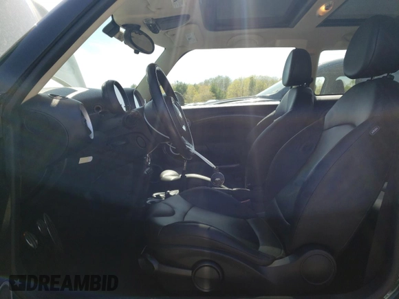 2013 MINI Hardtop S with VIN WMWSV3C52DT477324, listed as a Copart auction lot 55465525 with 66,092 mi miles and Clean Title. Bid and sale history available at DreamBid. Image 7.