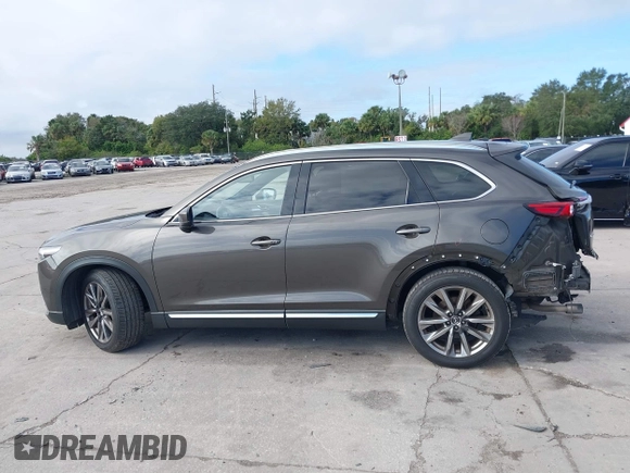 2017 Mazda CX-9 Grand Touring with VIN JM3TCADY7H0133092, listed as a IAAI auction lot 41133652 with 233,454 mi miles and . Bid and sale history available at DreamBid. Image 15.