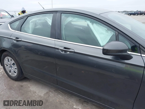 2019 Ford Fusion S with VIN 3FA6P0G79KR215541, listed as a IAAI auction lot 41626638 with 73,751 mi miles and . Bid and sale history available at DreamBid. Image 13.