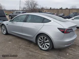 2018 Tesla Model 3 Long Range Battery with VIN 5YJ3E1EBXJF116906, listed as a IAAI auction lot 41913259 with 117,740 mi miles. Bid and sale history available at carsss.com. Image 3.
