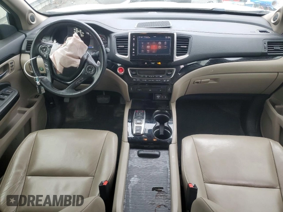 2017 Honda Pilot Touring with VIN 5FNYF6H99HB025600, listed as a Copart auction lot 88131475 with 131,939 mi miles and Salvage Title. Bid and sale history available at DreamBid. Image 8.