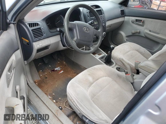 2007 Kia Spectra EX z VIN KNAFE121775389527, wystawiony jako Copart lot #56517285 z przebiegiem 340 861 mil mil oraz Szkoda całkowita • Salvage title. Historia ofert i sprzedaży dostępna na DreamBid. Obrazek 8.