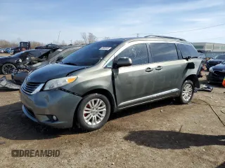 2011 Toyota Sienna XLE AAS with VIN 5TDYK3DC3BS065606, listed as a Copart auction lot 49585695 with 180,045 mi miles and Salvage title. Bid and sale history available at DreamBid. Image 1.