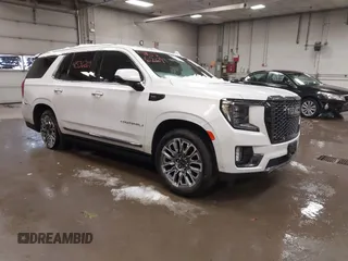2023 GMC Yukon Denali Ultimate with VIN 1GKS2EKL5PR329276, listed as a IAAI auction lot 41536269 with 38,406 mi miles. Bid and sale history available at carsss.com. Image 1.