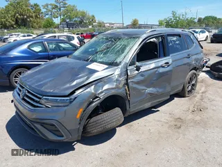 2024 Volkswagen Tiguan SE with VIN 3VVNB7AX6RM161369, listed as a IAAI auction lot 41888229 with 5,173 mi miles and . Bid and sale history available at DreamBid. Image 2.