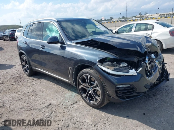 2021 BMW X5 sDrive40i with VIN 5UXCR4C01M9G07906, listed as a IAAI auction lot 41847036 with 16,307 mi miles. Bid and sale history available at carsss.com. Image 1.
