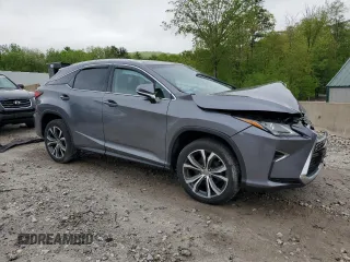 2017 Lexus RX 350 with VIN 2T2BZMCA3HC062628, listed as a Copart auction lot 56939425 with 93,379 mi miles and Salvage title. Bid and sale history available at DreamBid. Image 4.