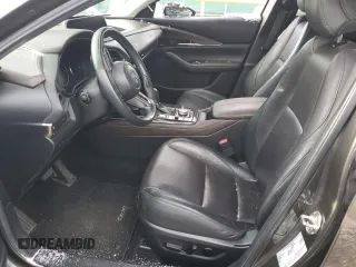 2020 Mazda CX-30 Premium z VIN 3MVDMBEM9LM127150, wystawiony jako Copart lot #51527295 z przebiegiem 27 207 mil mil oraz Szkoda całkowita • Salvage title. Historia ofert i sprzedaży dostępna na DreamBid. Obrazek 7.