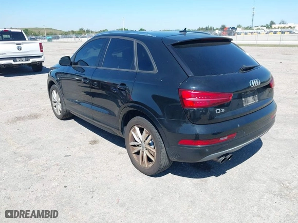 2017 Audi Q3 Premium with VIN WA1BCCFS6HR002749, listed as a IAAI auction lot 41776420 with 90,664 mi miles. Bid and sale history available at carsss.com. Image 3.