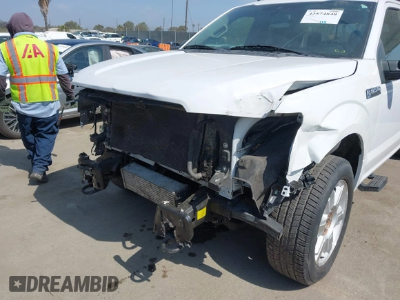 2019 Ford F-150 XL with VIN 1FTEW1EP1KKD58344, listed as a IAAI auction lot 42574848 with 54,133 mi miles and . Bid and sale history available at DreamBid. Image 6.