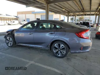 2017 Honda Civic Sedan EX-T with VIN 2HGFC1F34HH648975, listed as a Copart auction lot 47972315 with 169,999 mi miles and Salvage Title. Bid and sale history available at carsss.com. Image 2.