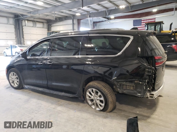 2021 Chrysler Pacifica Touring L with VIN 2C4RC3BG4MR573571, listed as a Copart auction lot 89388215 with 50,969 mi miles and Salvage title. Bid and sale history available at DreamBid. Image 2.