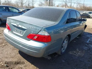 2003 Toyota Avalon XL z VIN 4T1BF28B33U293202, wystawiony jako IAAI lot #41768148 z przebiegiem 157 992 mil mil oraz . Historia ofert i sprzedaży dostępna na DreamBid. Obrazek 4.
