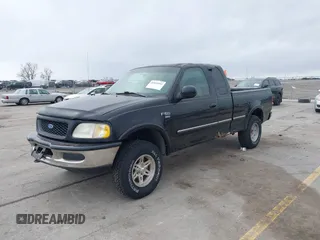 1998 Ford F-150 with VIN 1FTZX1868WKA44830, listed as a IAAI auction lot 41851933 with 240,813 mi miles and . Bid and sale history available at DreamBid. Image 2.