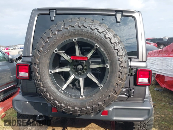 2019 Jeep Wrangler Unlimited Sahara with VIN 1C4HJXEG7KW661801, listed as a IAAI auction lot 40848731 with Not provided miles and . Bid and sale history available at DreamBid. Image 15.