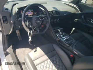 2023 Audi R8 performance quattro z VIN WUACEAFX9P7900103, wystawiony jako Copart lot #57456835 z przebiegiem 5 220 mil mil oraz Szkoda całkowita • Salvage title. Historia ofert i sprzedaży dostępna na DreamBid. Obrazek 8.