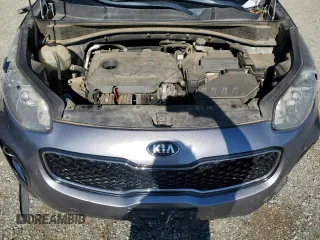 2017 Kia Sportage LX z VIN KNDPMCACXH7068094, wystawiony jako Copart lot #56706805 z przebiegiem 119 304 mil mil oraz Szkoda całkowita • Salvage title. Historia ofert i sprzedaży dostępna na DreamBid. Obrazek 11.
