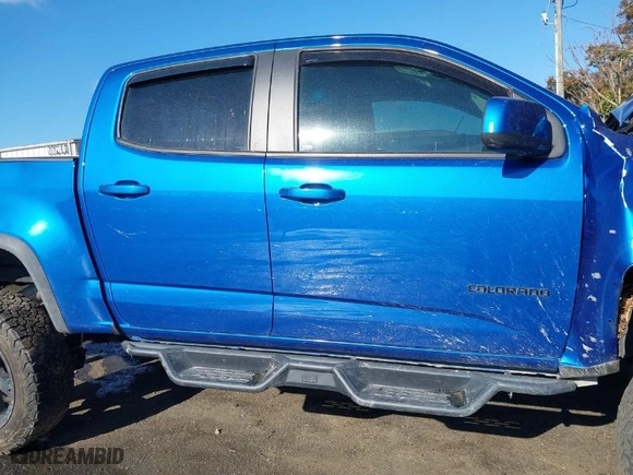 2019 Chevrolet Colorado 4WD ZR2 with VIN 1GCGTEEN5K1279370, listed as a IAAI auction lot 41879724 with 99,012 mi miles. Bid and sale history available at carsss.com. Image 13.