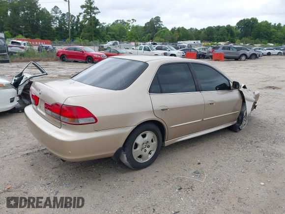 2001 Honda Accord EX z VIN 1HGCG16561A080094, wystawiony jako IAAI lot #42230752 z przebiegiem 246 469 mil mil oraz . Historia ofert i sprzedaży dostępna na DreamBid. Obrazek 4.