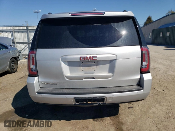 2015 GMC Yukon SLE with VIN 1GKS2AKC2FR200015, listed as a Copart auction lot 45371345 with 66,525 mi miles and Salvage Title. Bid and sale history available at carsss.com. Image 6.