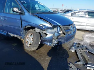 2007 Dodge Grand Caravan SXT with VIN 2D4GP44LX7R313906, listed as a IAAI auction lot 41402653 with 82,315 mi miles and . Bid and sale history available at DreamBid. Image 6.