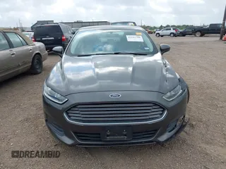 2016 Ford Fusion S z VIN 3FA6P0G72GR132394, wystawiony jako IAAI lot #42142780 z przebiegiem 66 013 mil mil oraz . Historia ofert i sprzedaży dostępna na DreamBid. Obrazek 13.