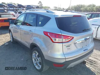 2016 Ford Escape Titanium with VIN 1FMCU0J94GUB11776, listed as a IAAI auction lot 41945655 with 119,949 mi miles. Bid and sale history available at carsss.com. Image 3.