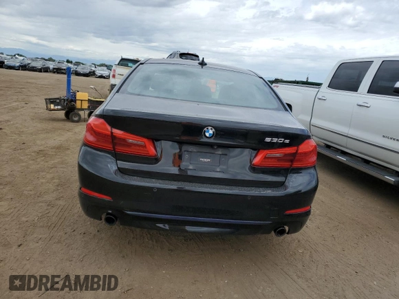 2018 BMW 5 Series 530e xDrive with VIN WBAJB1C56JB084629, listed as a Copart auction lot 67956564 with 83,302 mi miles and Non Repairable. Bid and sale history available at carsss.com. Image 6.