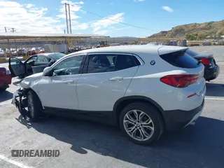 2020 BMW X2 sDrive28i with VIN WBXYH9C01L5P01913, listed as a IAAI auction lot 41591563 with 65,271 mi miles. Bid and sale history available at carsss.com. Image 14.