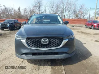 2023 Mazda CX-5 S Premium with VIN JM3KFBDM7P0201038, listed as a IAAI auction lot 41772989 with 26,227 mi miles and . Bid and sale history available at DreamBid. Image 12.