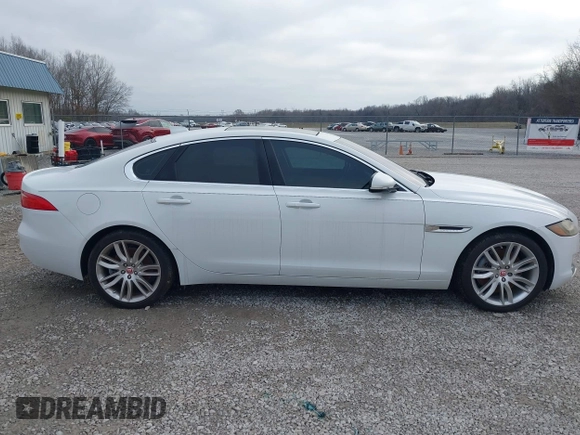 2016 Jaguar XF 35t Prestige with VIN SAJBE4BVXGCY10577, listed as a IAAI auction lot 41515540 with 60,862 mi miles. Bid and sale history available at carsss.com. Image 13.