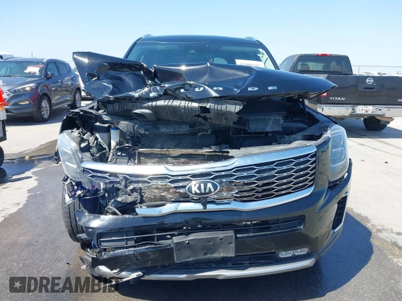 2020 Kia Telluride SX with VIN 5XYP54HC8LG075209, listed as a IAAI auction lot 42000202 with 107,590 mi miles and . Bid and sale history available at DreamBid. Image 12.