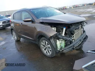 2014 Kia Sportage LX with VIN KNDPB3AC7E7569865, listed as a IAAI auction lot 41827160 with 55,060 mi miles. Bid and sale history available at carsss.com. Image 1.