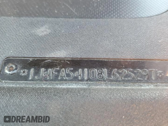 2008 Jeep Wrangler Sahara with VIN 1J4FA54108L625297, listed as a Copart auction lot 46832405 with 144,848 mi miles and Salvage title. Bid and sale history available at DreamBid. Image 14.