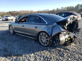 2015 Audi A8 z VIN WAUJGAFD9FN022023, wystawiony jako Copart lot #86048354 z przebiegiem Nie podano mil oraz Szkoda całkowita • Salvage title. Historia ofert i sprzedaży dostępna na DreamBid. Obrazek 2.