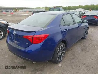 2018 Toyota Corolla L with VIN 2T1BURHE5JC973402, listed as a IAAI auction lot 42221771 with 47,282 mi miles and . Bid and sale history available at DreamBid. Image 4.