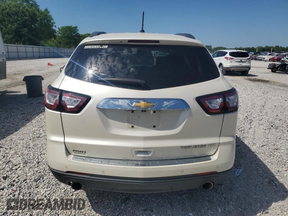 2014 Chevrolet Traverse LTZ z VIN 1GNKRJKD7EJ175097, wystawiony jako Copart lot #56717045 z przebiegiem 113 041 mil mil oraz Szkoda całkowita • Salvage title. Historia ofert i sprzedaży dostępna na DreamBid. Obrazek 6.