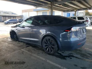 2023 Tesla Model X with VIN 7SAXCDE55PF410146, listed as a Copart auction lot 48818085 with 26,494 mi miles and Salvage Title. Bid and sale history available at DreamBid. Image 2.